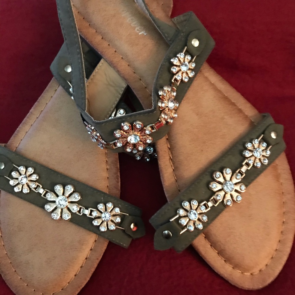 Forever sandals embellished both stripes.